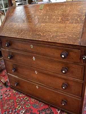 Lot 462 - A 19th century oak bureau, with fitted...