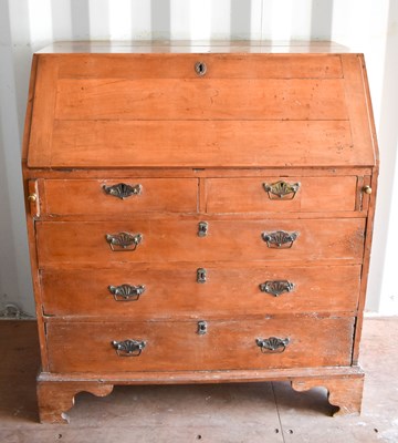 Lot 461 - A 19th century mahogany bureau, the fall front...