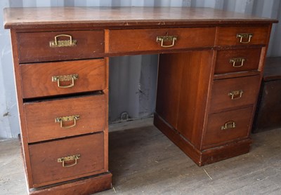 Lot 438 - An early 20th century pedestal desk, with two...