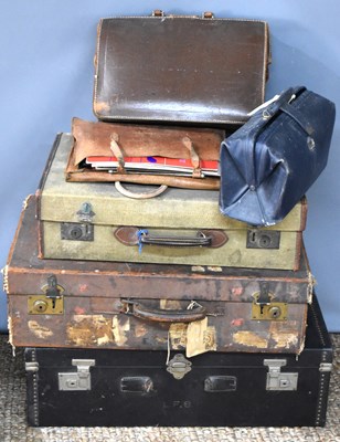 Lot 173 - Three vintage leather bound travelling trunks...