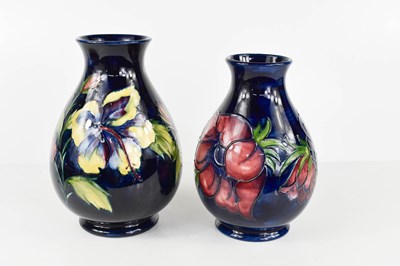 Lot 7 - A pair of Moorcroft vases, one in the iris...