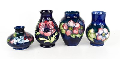 Lot 4 - A group of four Moorcroft vases, of various...