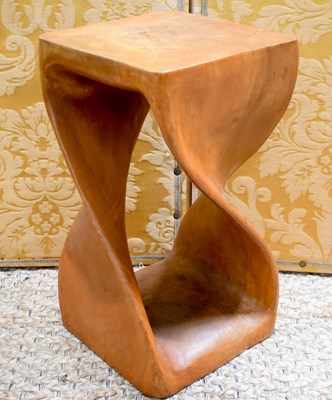 Lot 444 - A Mid-Century hardwood stand, carved from the...