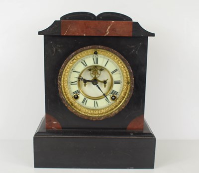 Lot 324 - A Victorian slate mantle clock having an...