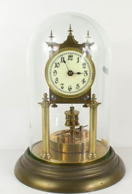 Lot 280 - An early 20th century brass torsion clock,...