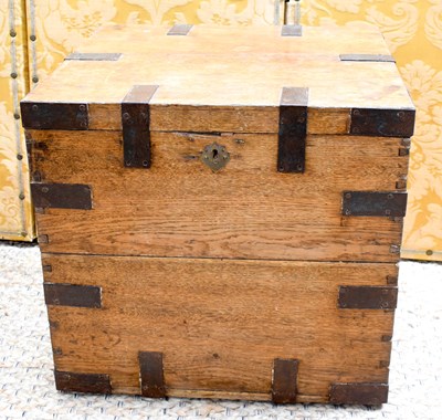 Lot 483 - An oak and iron bound silver chest, with lift...