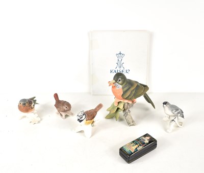 Lot 156 - A group of porcelain model birds, to include...