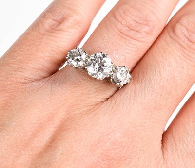 Lot 5 - A stunning 18ct white gold and diamond three...