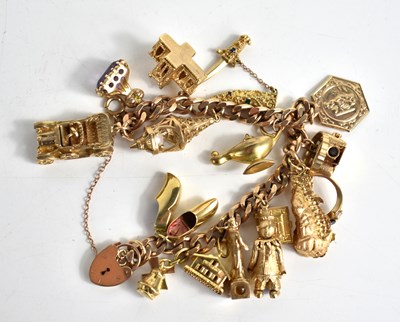 Lot 332 - A 9ct gold chain link charm bracelet, with...