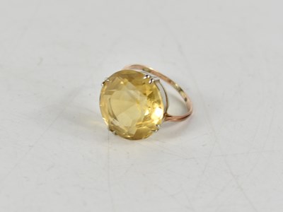 Lot 299 - A 9ct gold and citrine ring, 4.7g.