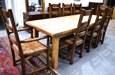 Lot 497 - A vintage pine refectory style dining table...