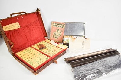 Lot 372 - A vintage leather cased Mahjong set, with...