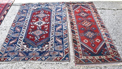 Lot 506 - A Middle Eastern wool rug and runner, blue and...