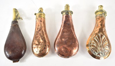 Lot 245 - Three 19th century copper powder flasks, one...