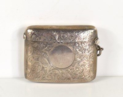 Lot 350 - A silver vesta case with foliate decoration,...