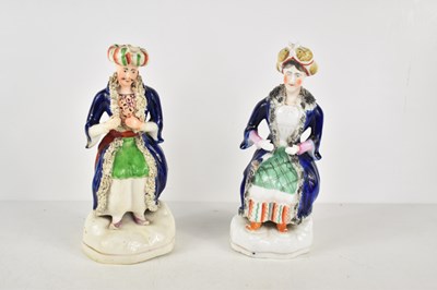 Lot 151 - A pair of 19th century Staffordshire figures...