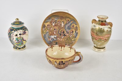 Lot 86 - A Japanese Satsuma cup and saucer decorated...