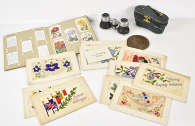 Lot 243 - A group of collectables to include WWI silk...