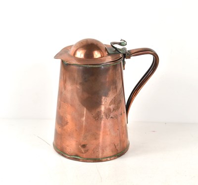 Lot 402 - An Arts and Crafts copper water jug by Joseph...