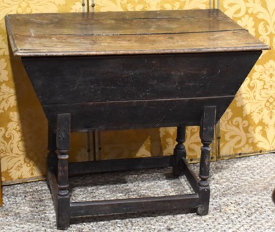 Lot 526 - A 19th century oak dough bin raised on four...