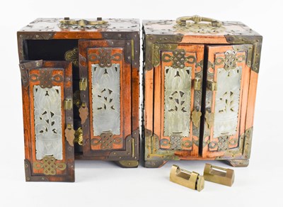 Lot 114 - A pair of Chinese table cabinets, clad in...