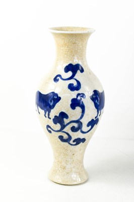 Lot 13 - A Chinese stoneware Qing period glazed vase,...