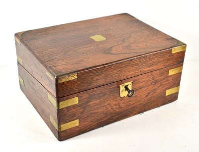 Lot 125 - A Victorian rosewood writing box with brass...