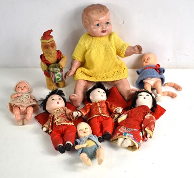 Lot 367 - A vintage clockwork toy monkey playing drums,...