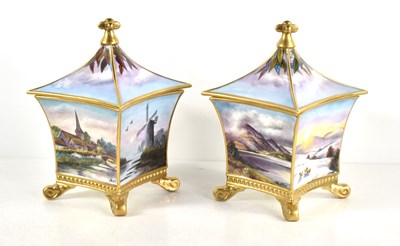 Lot 186 - A pair of decorative pot and covers hand...