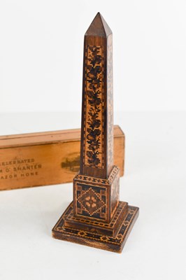 Lot 130 - A Mauchline ware Tam O Shanter razor hone,...