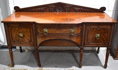 Lot 545 - A Regency mahogany breakfront sideboard, the...