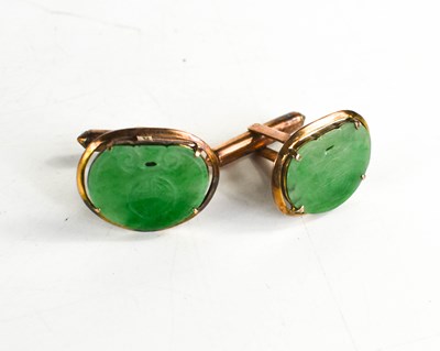 Lot 30 - A pair of Chinese 14ct gold and jade cufflinks,...