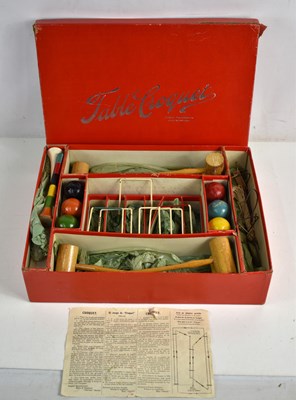 Lot 371 - A vintage table top croquet set by Glevum,...