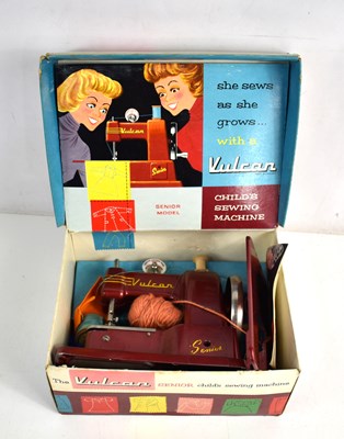 Lot 358 - A vintage Vulcan senior child's sewing machine...