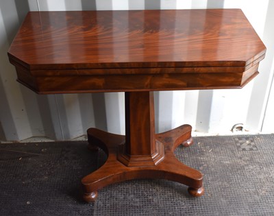 Lot 533 - A 19th century mahogany card table with swivel...