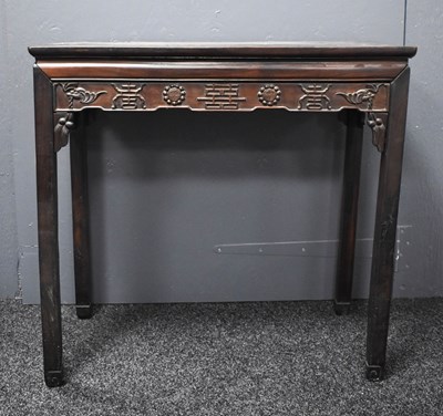 Lot 112 - A 19th century Chinese altar table, the shaped...