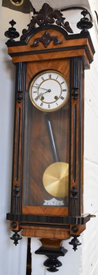 Lot 410 - A Victorian Vienna style mahogany wall clock,...