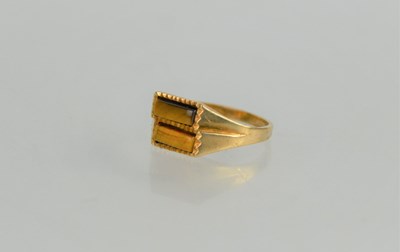 Lot 133 - A 9ct gold tiger eye ring, 2.73g, size O 1/2