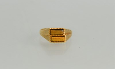 Lot 133 - A 9ct gold tiger eye ring, 2.73g, size O 1/2