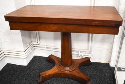 Lot 517 - A 19th century mahogany card table with swivel...