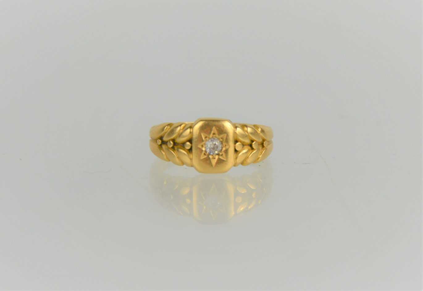 Lot 153 - An 18ct gold and diamond starburst ring with...