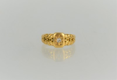 Lot 153 - An 18ct gold and diamond starburst ring with...