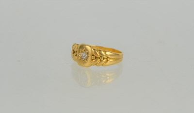 Lot 153 - An 18ct gold and diamond starburst ring with...