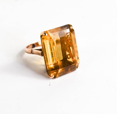 Lot 26A - A 14ct gold and yellow quartz ring, the trap...