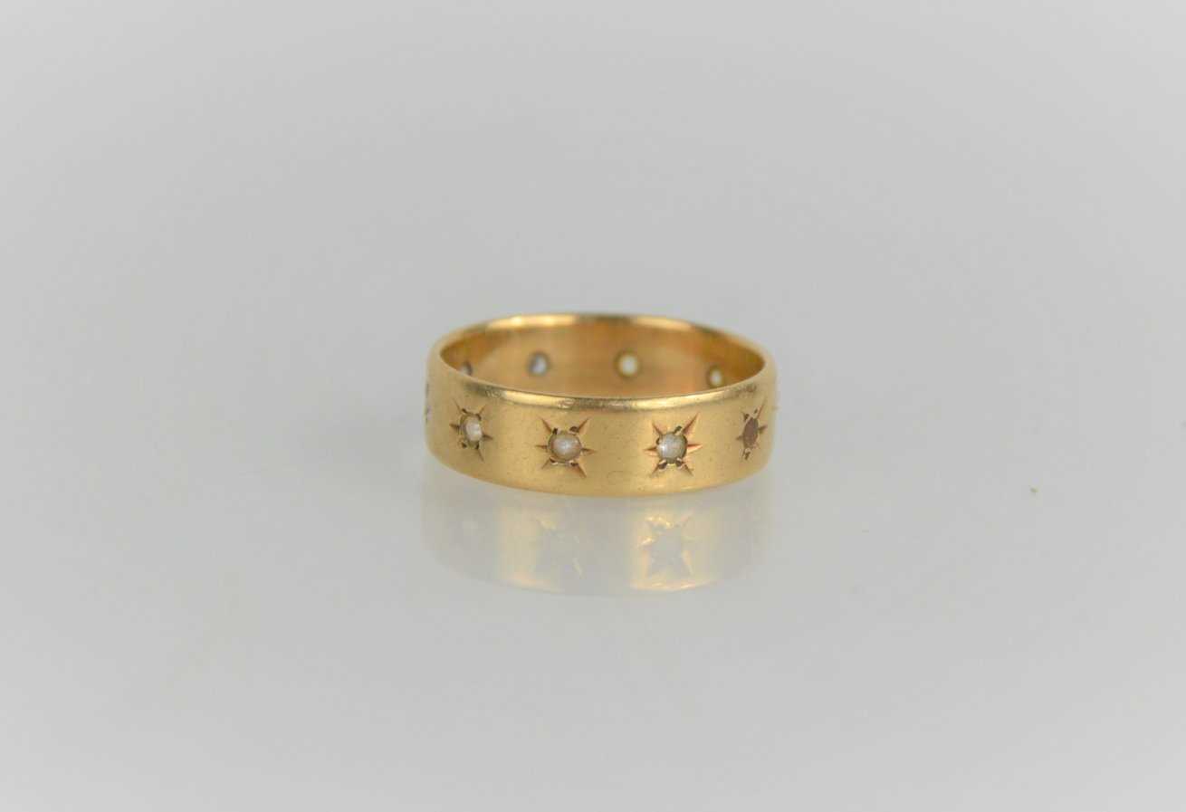 Lot 109 - A 9ct gold and diamond starburst ring, 3g, size O