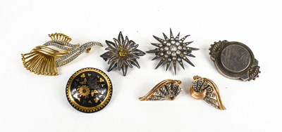 Lot 148 - A group of Victorian and later brooches...