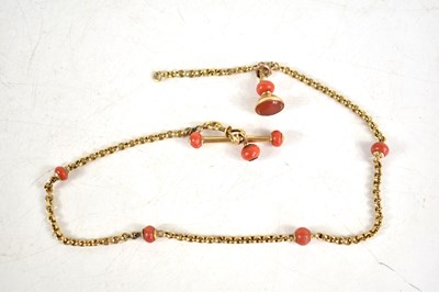 Lot 250 - An antique gold and coral Albert chain with a...