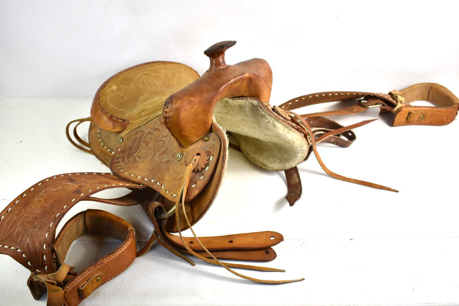 Lot 359 - A vintage western leather pony saddle with...