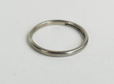 Lot 204 - A palladium wedding band, size T, 2.3g.