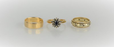 Lot 155 - Two 9ct gold rings, 7.3g and a silver example